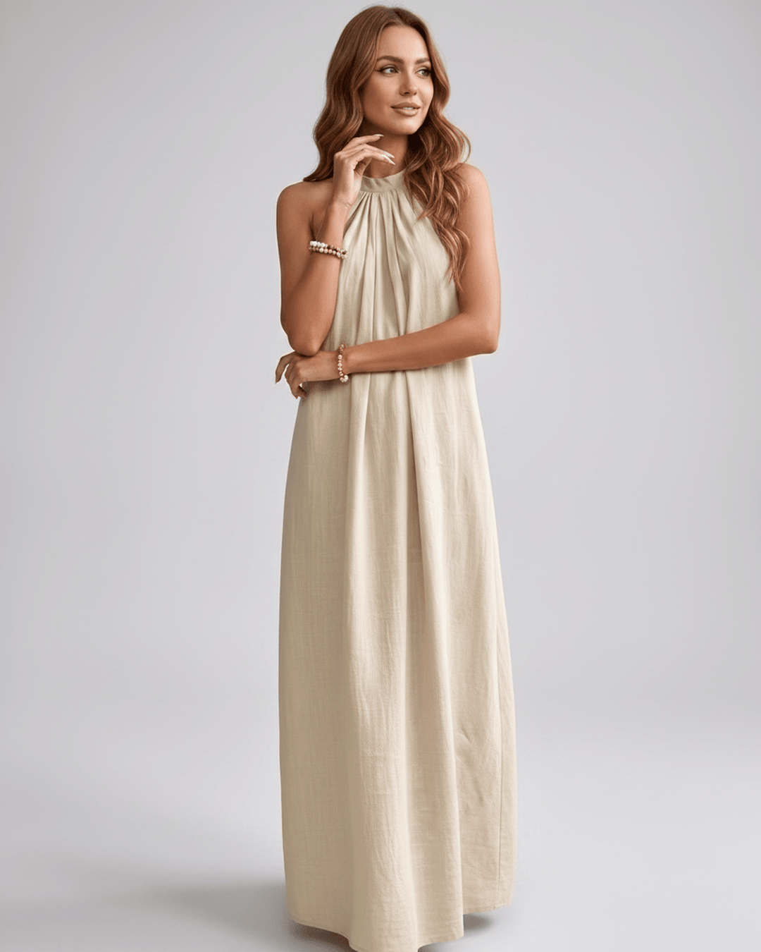 Vestido maxi halter fluido y fresco, ideal para días de calor con estilo.