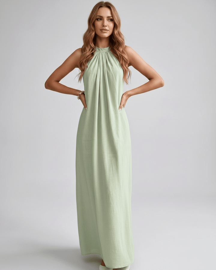 Vestido de verano femenino, cuello halter y diseño fluido. Confort para el día a día.