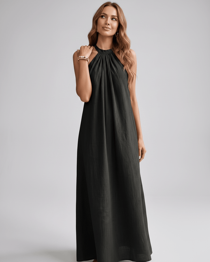 Vestido bohemio maxi halter, tejido ligero y ajuste relajado para el verano.