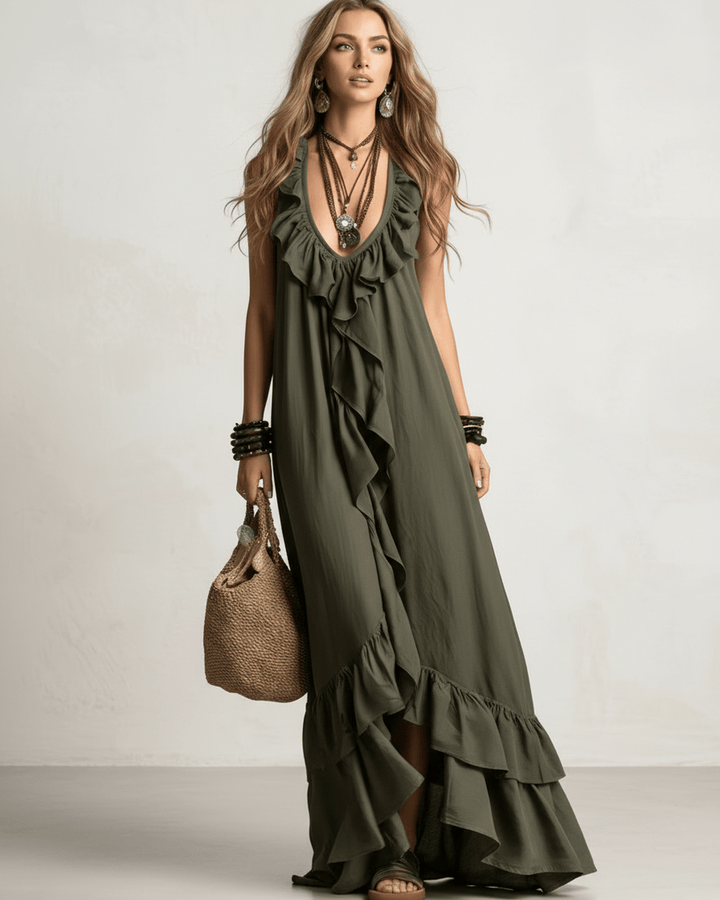 Ropa de playa: vestido maxi sin mangas con volantes, escote en V y espalda abierta.