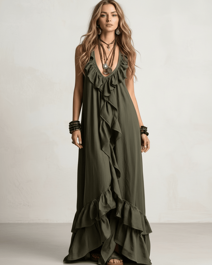 Elegante vestido maxi para mujer, con escote en V y diseño fluido de volantes.
