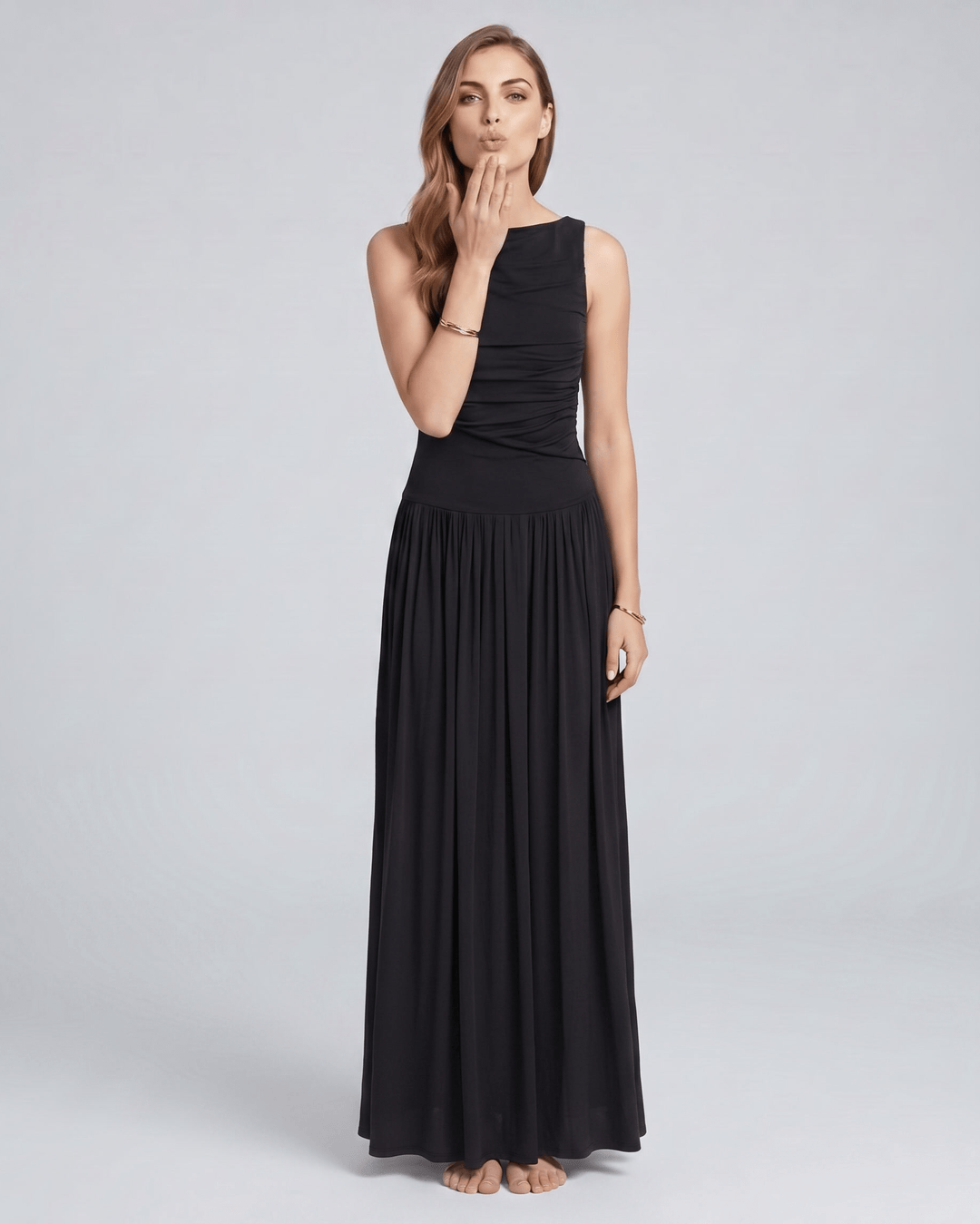 Vestido maxi Aurea de mujer con caída fluida. Sin mangas, elegante y perfecto para eventos.