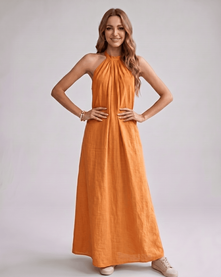 Maxi vestido halter, ajuste holgado, ideal para la comodidad y el estilo bohemio.