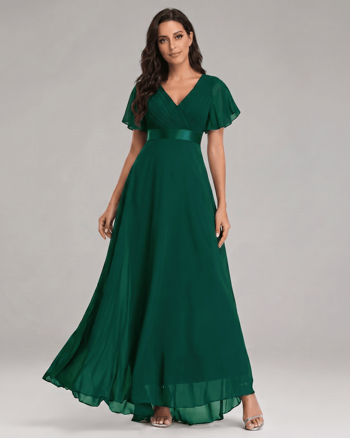 Vestido maxi elegante para mujer con escote V, estilo fluido.