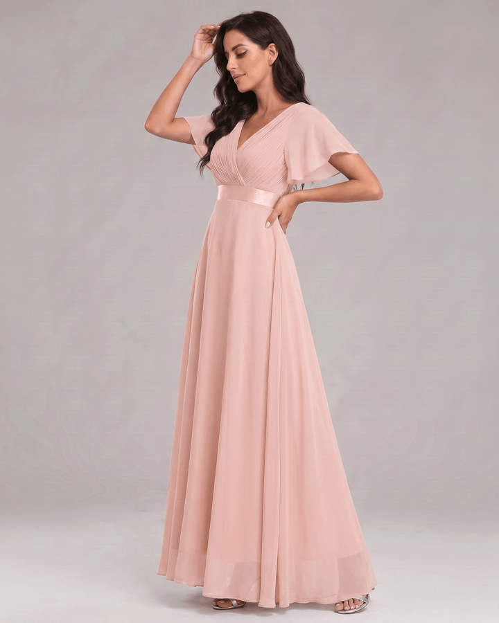 Vestido sofisticado maxi, escote V, ideal para fiesta o evento formal.