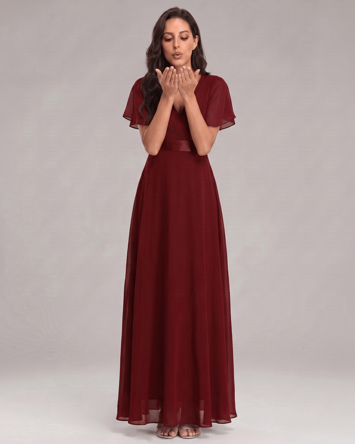 Moda femenina: Vestido maxi con escote V, elegante, sofisticado, fluido.
