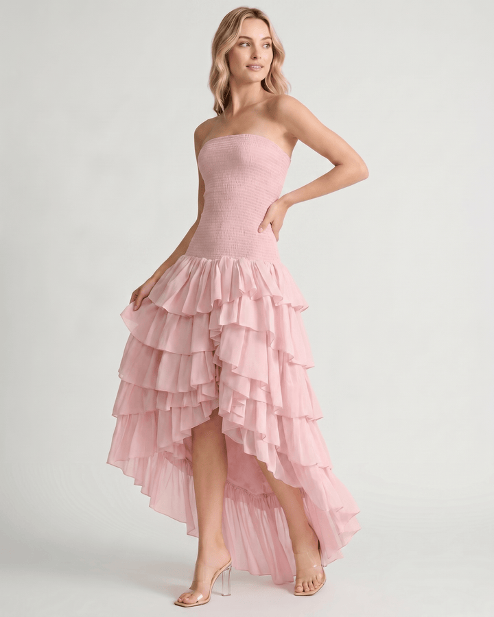 Vestido de mujer sin mangas, diseño maxi con dobladillo asimétrico, fluido y moderno.