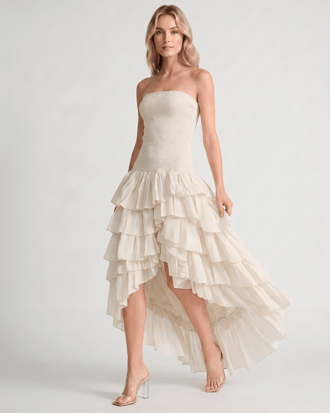 Vestido de fiesta con dobladillo asimétrico, ideal para eventos de noche y cócteles.