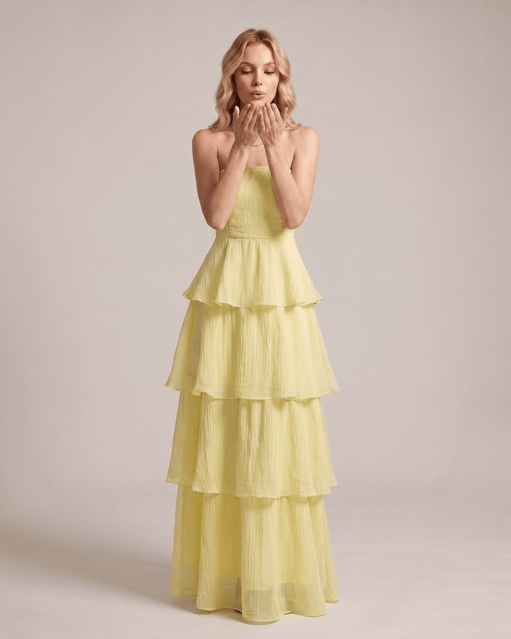 Vestido largo sin tirantes, ideal para mujer en eventos de gala o cóctel.
