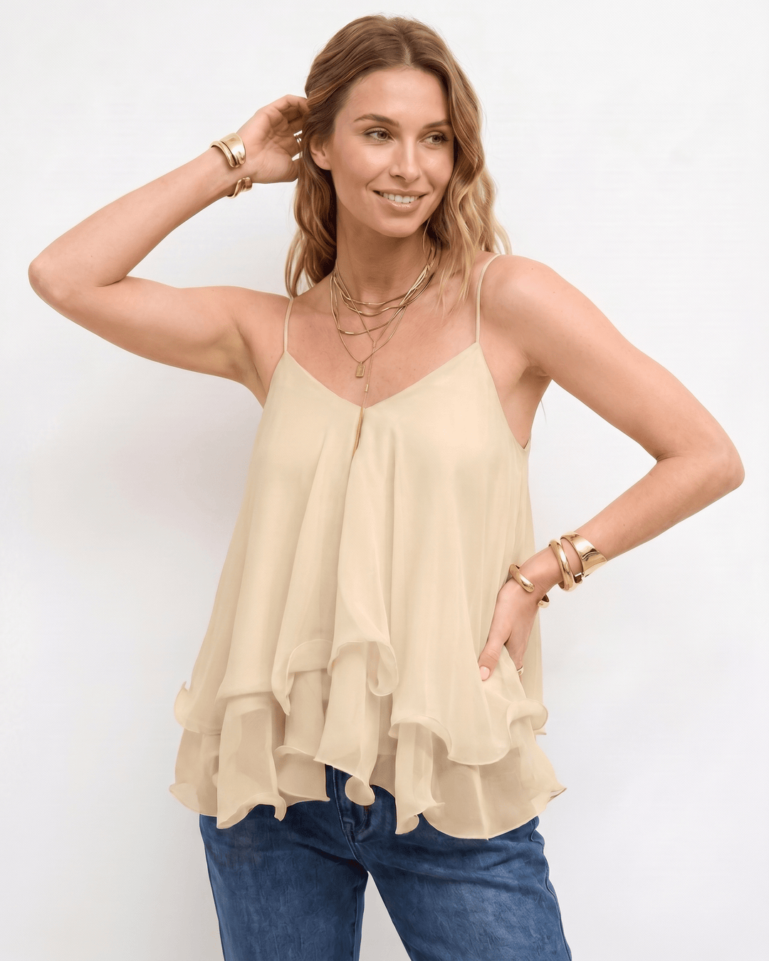 Top mujer sin mangas, fluido, con escote en V, para un look fresco y casual.