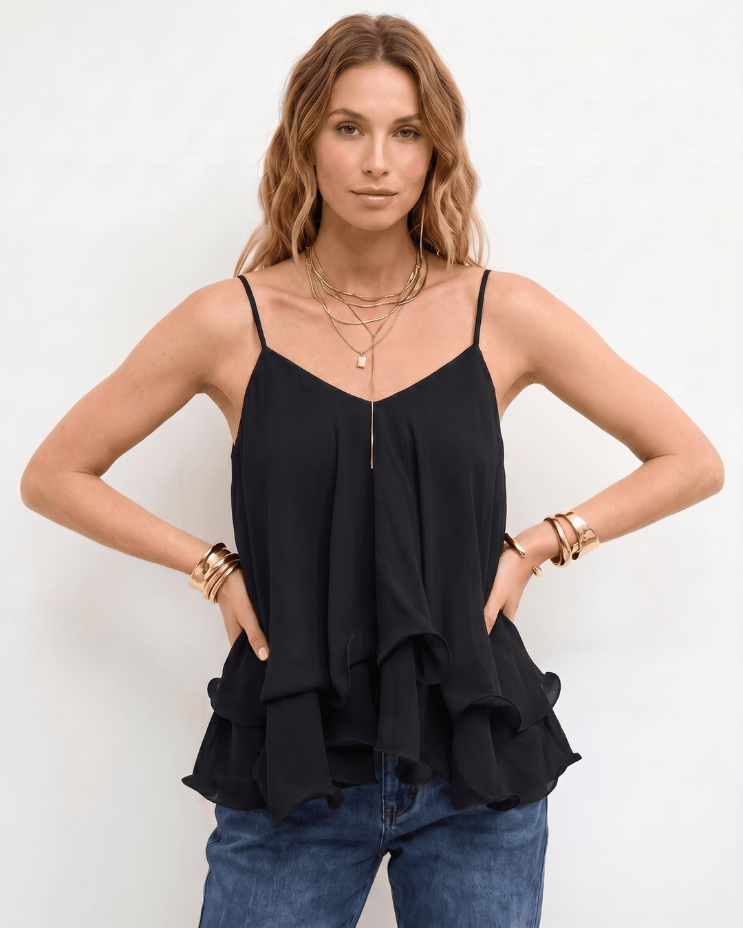 Blusa Aureline sin mangas, fluida, para un look sofisticado y veraniego.