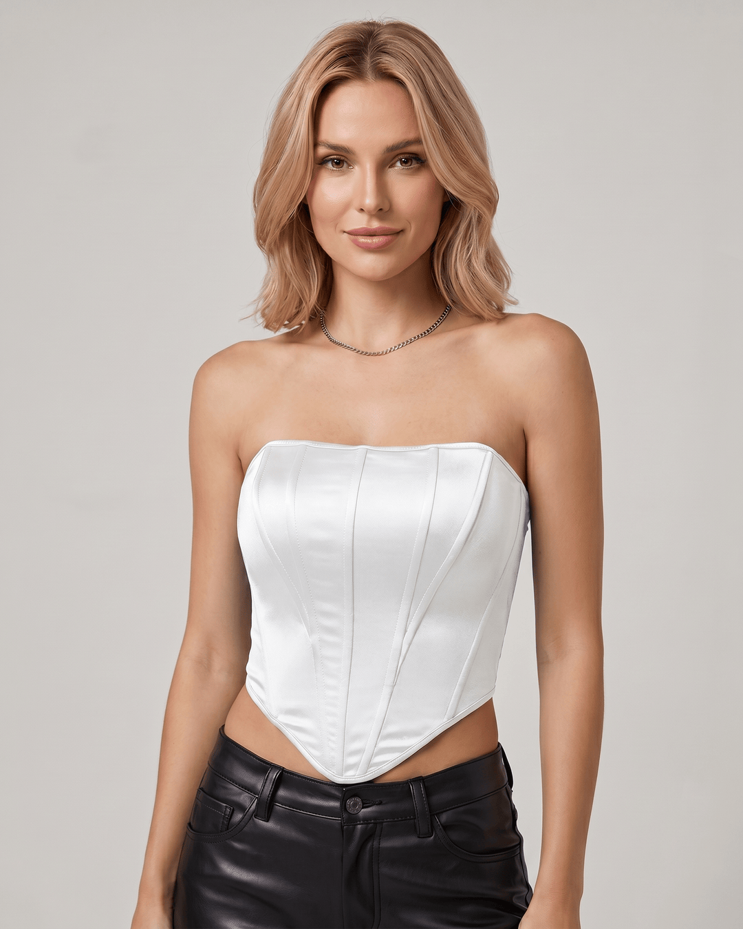 Top corset de veloura para mujer, versátil y moderno, ideal para estilo noche o diurno.