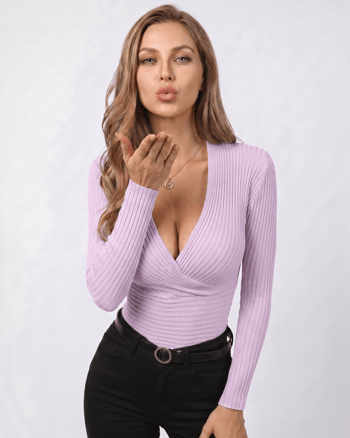 Suéter de moda para mujer, acanalado, escote V. Combínalo con accesorios para destacar.