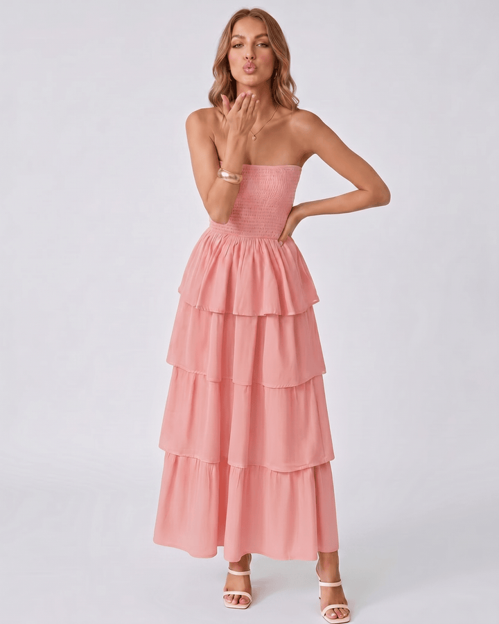 Vestido Solenne mujer, estilo sin tirantes. Maxi con volantes, creando un look fluido y femenino.