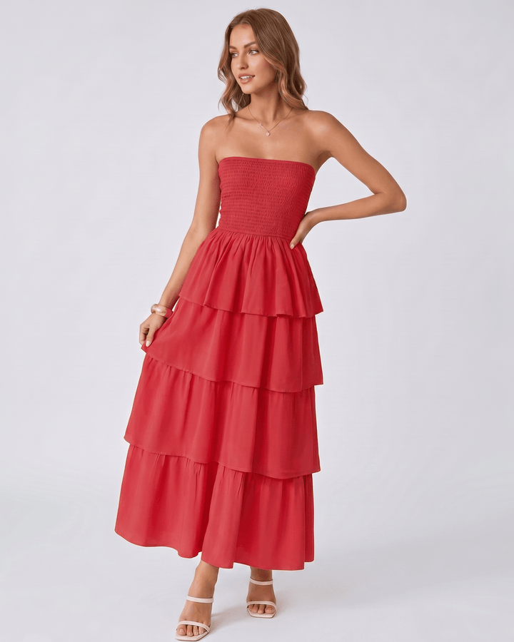 Vestido Solenne mujer, sin tirantes y con volantes. Maxi, ideal para eventos, añade un toque fluido.
