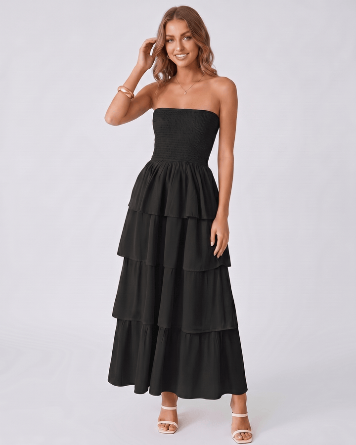 Vestido maxi Solenne con volantes en silueta sin tirantes. Prenda de fiesta femenina y chic.