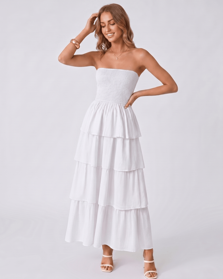Vestido de fiesta maxi Solenne con volantes. Estilo sin tirantes, perfecto para mujer en verano.