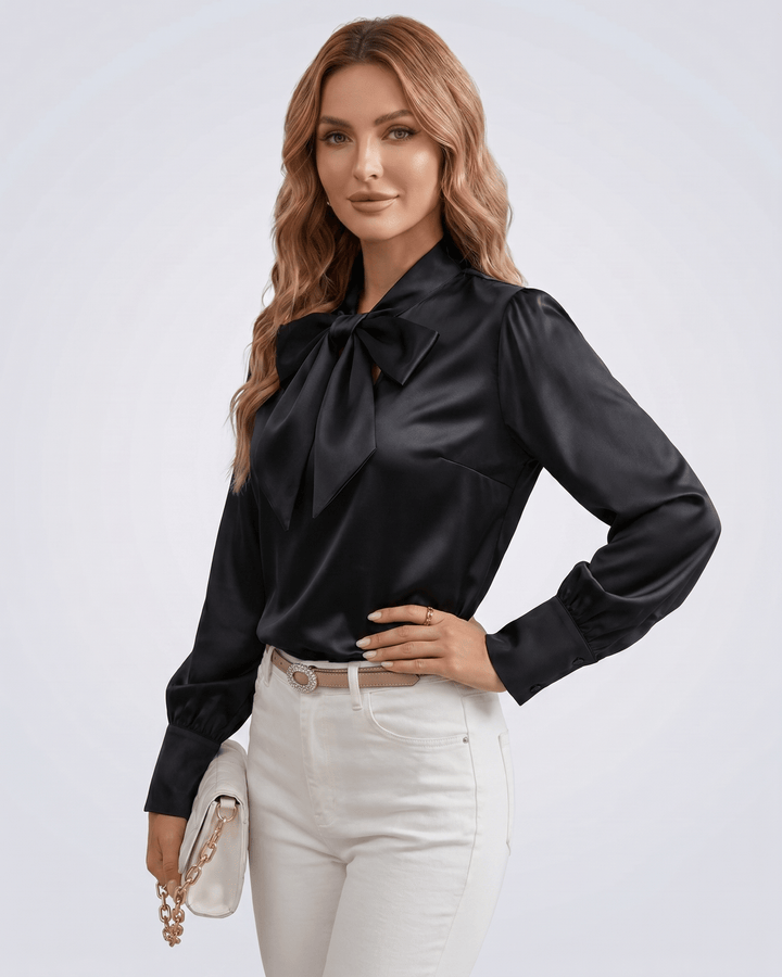 Blusa con lazo al cuello para mujer, mangas largas, combinada con falda. Look elegante.