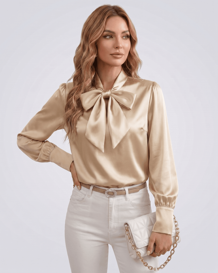 Blusa de mujer con lazada en el cuello, mangas largas. Un toque chic en tu armario.