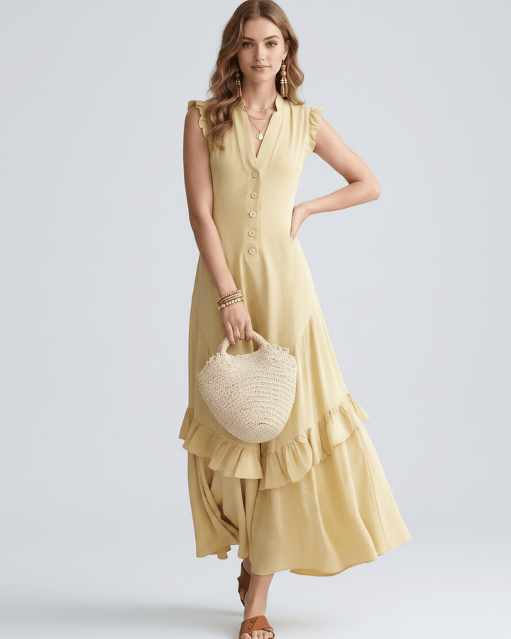 Moda de verano: vestido maxi para mujer con escote en V, volantes. Vestido largo y fluido.