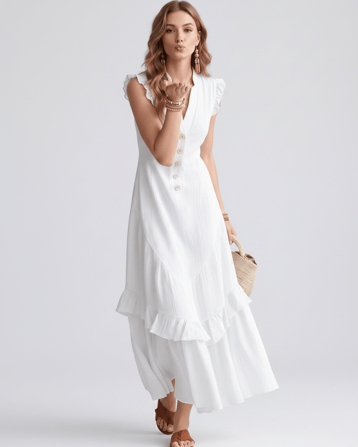 Vestido maxi de moda con escote en V y volantes fluidos. Ideal para mujeres en verano.