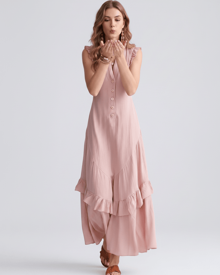 Vestido de mujer con volantes fluidos y escote en V. Vestido maxi sin mangas, ideal para verano.