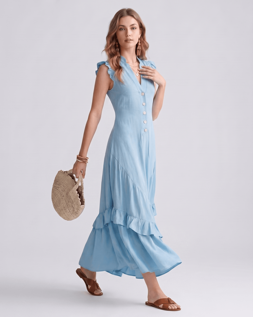 Vestido largo elegante con volantes fluidos y escote en V. Moda de verano para mujeres.