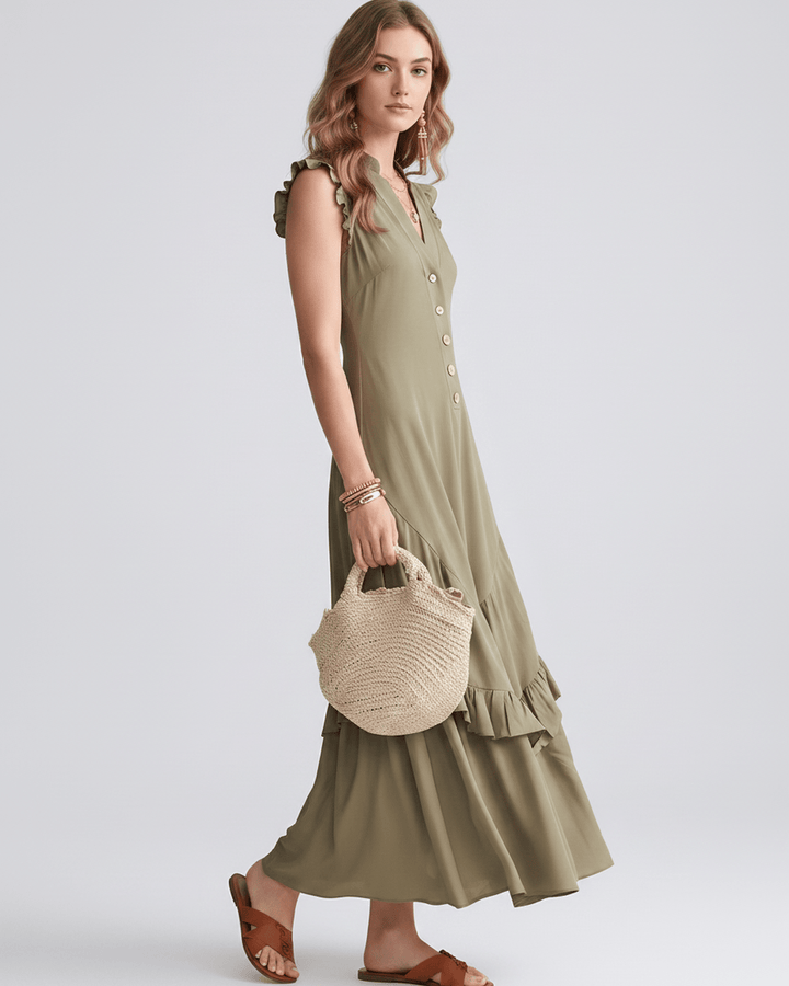 Vestido de mujer con escote en V y volantes. Vestido maxi sin mangas, ideal para ropa de fiesta.