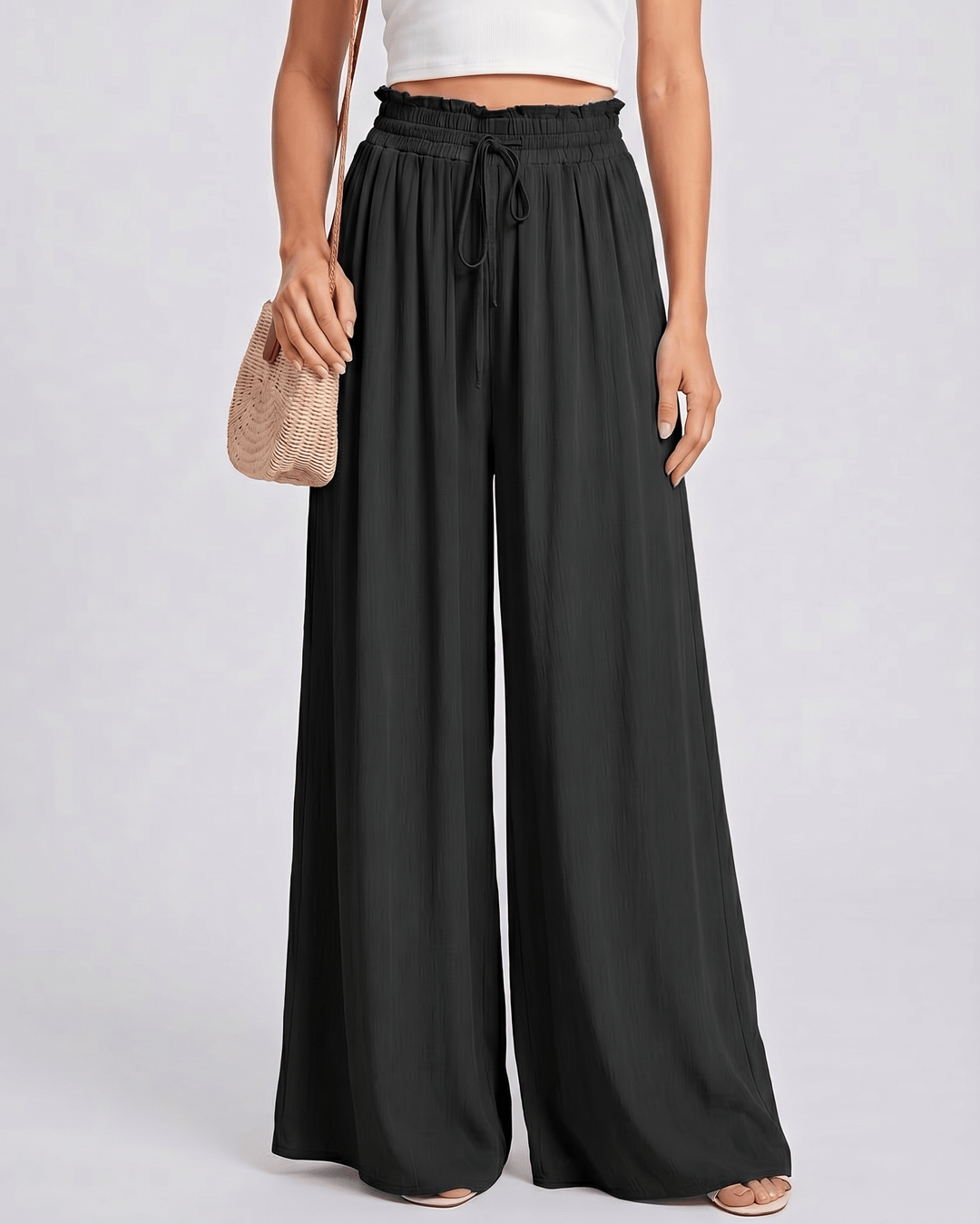 Pantalones de mujer Selene, pierna ancha, cintura alta, perfectos para un estilo elegante de verano.