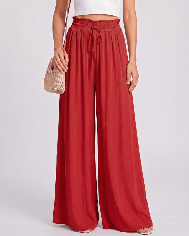Pantalones Selene de mujer, pierna ancha, cintura alta, ideales para relajarse con elegancia en verano.