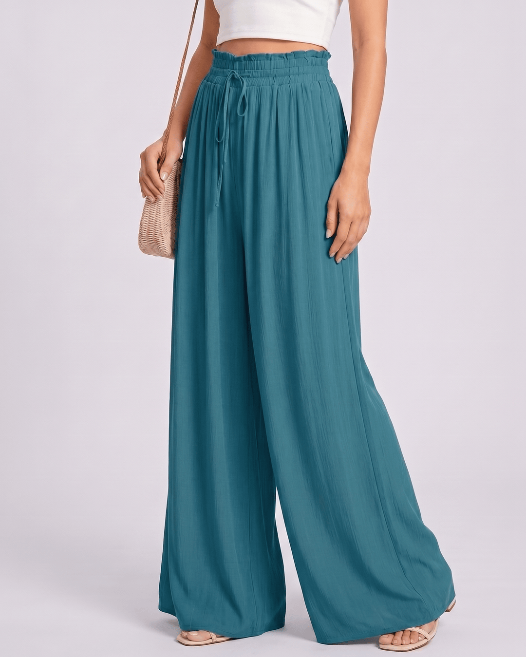Pantalones Selene de mujer fluidos, cintura alta, pierna ancha, cómodos para el verano.