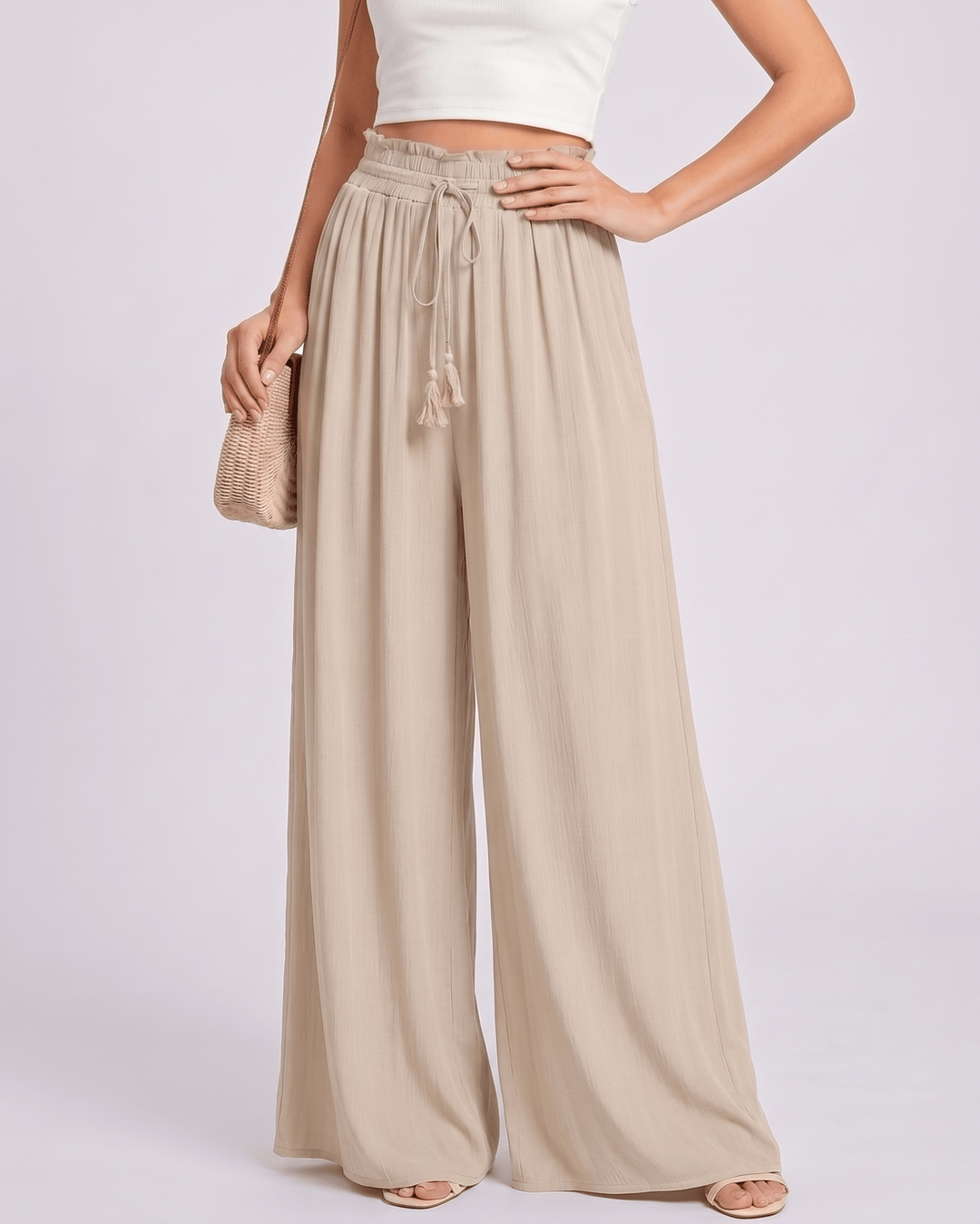 Selene: pantalones de mujer, pierna ancha, cintura alta, tela fluida para máximo confort.