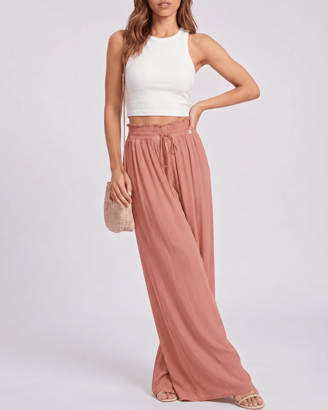 Pantalones Selene casuales de mujer, pierna ancha, cintura alta, ideales para tus paseos de verano.
