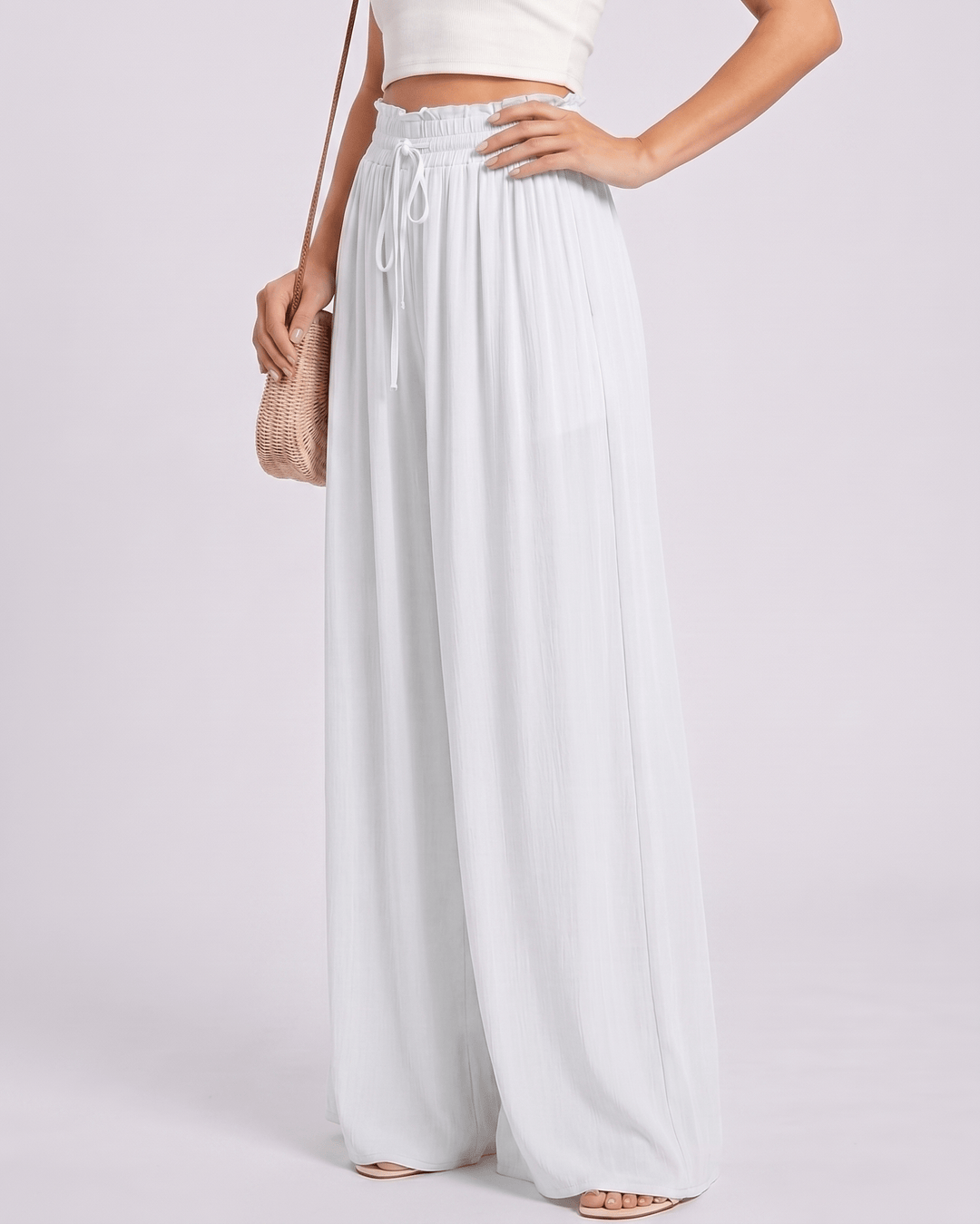 Selene: pantalones fluidos de mujer, pierna ancha, cintura alta, ideales para cualquier plan de verano.