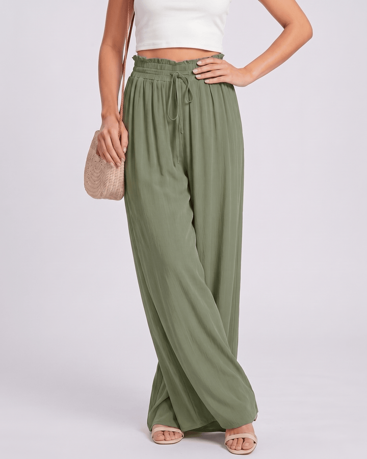 Moda de verano: pantalones Selene de mujer, pierna ancha, cintura alta, look casual.