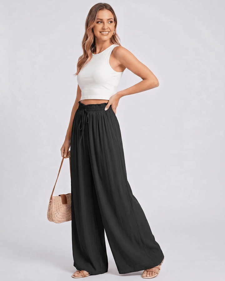 Look de verano con pantalones Selene de mujer, cintura alta, pierna ancha, estilo casual.