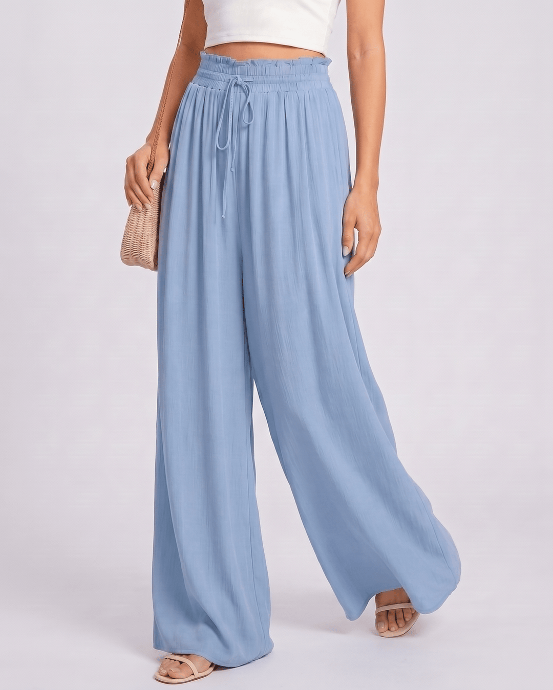 Pantalones Selene mujer, pierna ancha, cintura alta, versátiles para looks de verano.