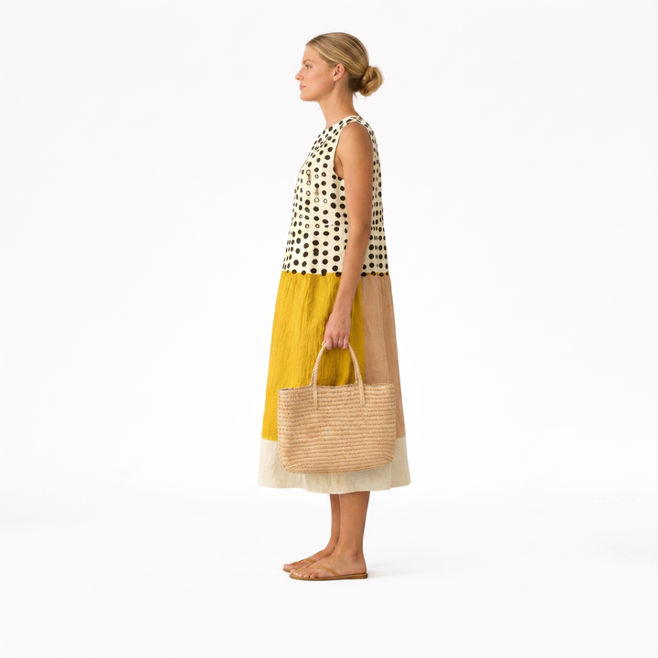 Elegante vestido midi casual de lunares para mujer. Diseño de verano fresco, sin mangas y muy versátil.