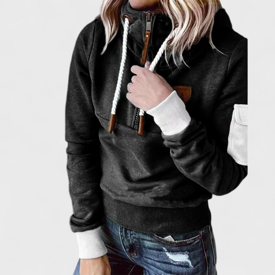 Suéter negro de felpa, estilo versátil y cómodo para mujer, ideal para cualquier ocasión.