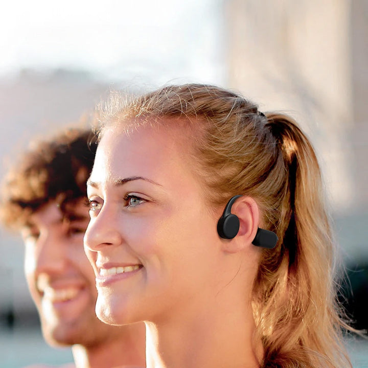 Auriculares deportivos de conducción ósea, diseñados para máxima comodidad y rendimiento en ejercicio.