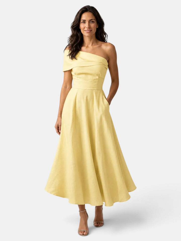 Vestido largo amarillo asimétrico para invitada de boda. Elegante vestido de fiesta para ocasiones especiales.