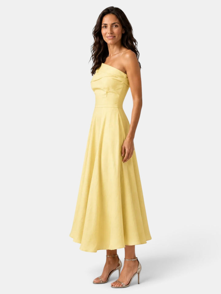 Maxi vestido amarillo vibrante, ideal para invitada de boda. Vestido elegante de mujer para celebraciones.