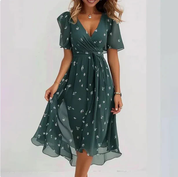 Vestido midi floral para mujer con escote en V y mangas cortas, ideal para verano y ocasiones elegantes.