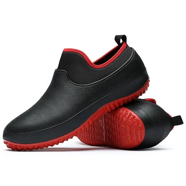 Zapatos de trabajo unisex impermeables sin cordones. Calzado de seguridad antideslizante, ideal para confort laboral y protección.
