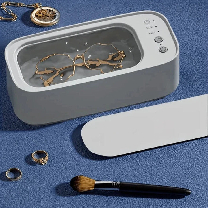 Limpiador ultrasónico profesional para joyas, gafas y relojes, disponible en blanco y rosa, acero inoxidable.