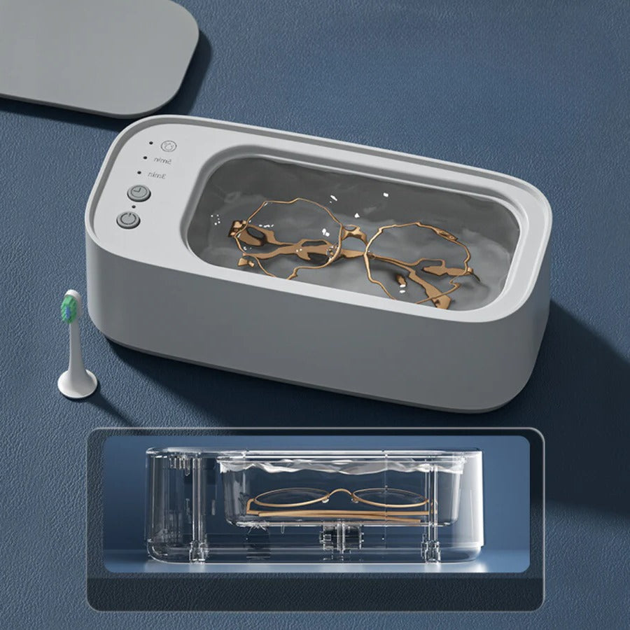 Limpiador ultrasónico blanco para joyas, gafas y relojes. Dispositivo de limpieza profesional para el hogar.