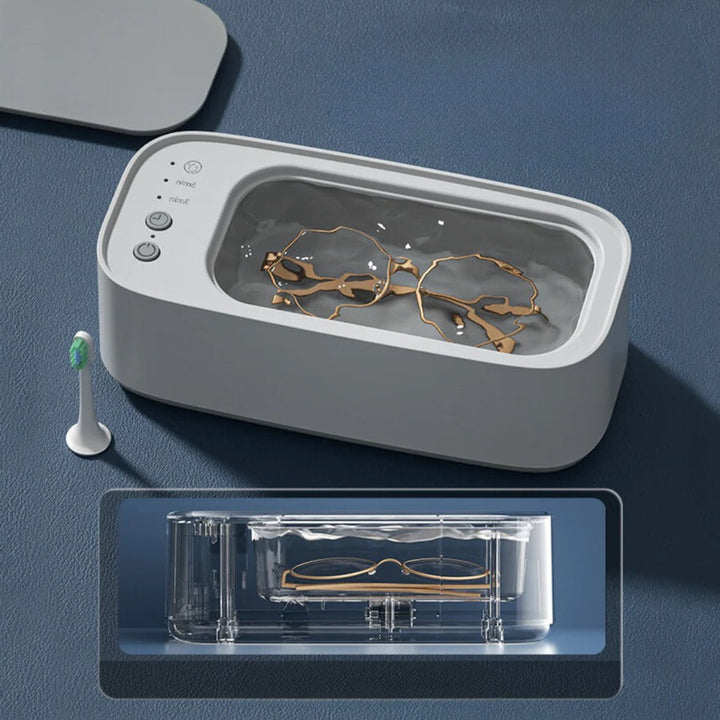 Limpiador ultrasónico blanco para joyas, gafas y relojes. Dispositivo de limpieza profesional para el hogar.