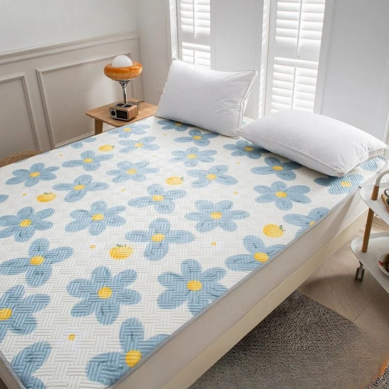Protector de colchón lavable que protege y mantiene tu cama fresca y limpia.