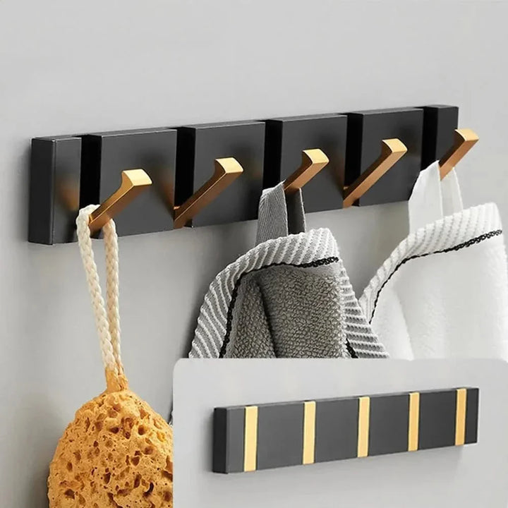 Organizador de pared minimalista. Gancho adhesivo para toallas y abrigos.