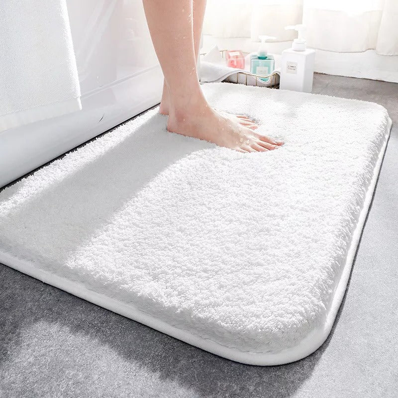 Alfombra de baño absorbente de lujo para decoración moderna, mantiene el piso seco y aporta elegancia al hogar.